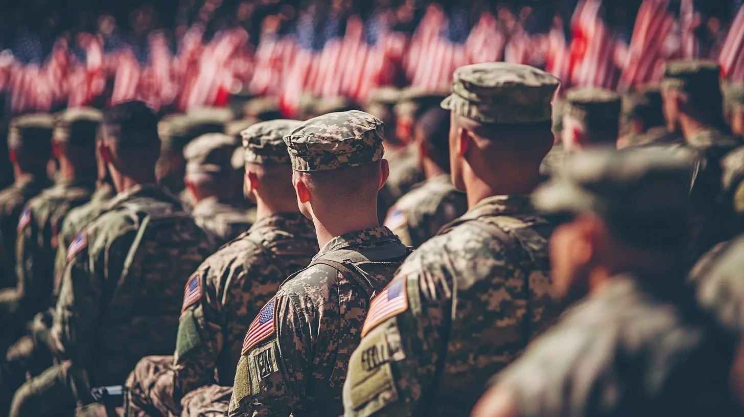 group of soldiers in camouflage uniforms standing in formation, with American flags displayed in the background