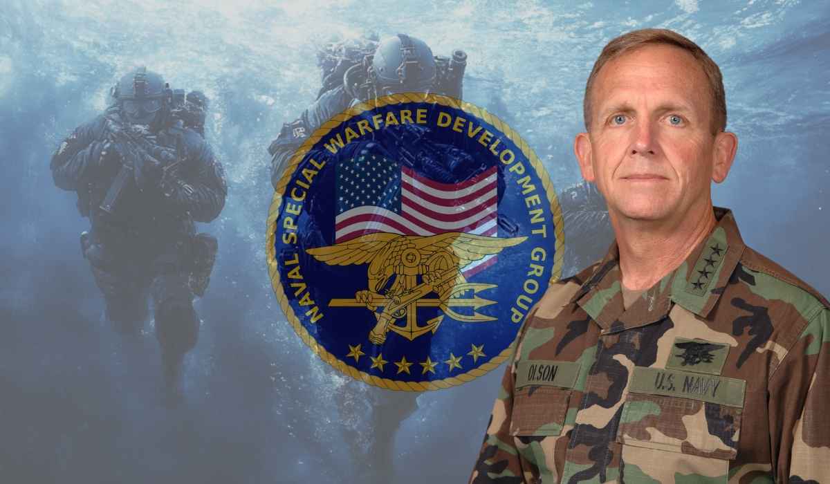 Admiral Eric T. Olson in camouflage uniform with Navy SEAL trident patch, standing before a Naval Special Warfare Development Group emblem and underwater SEALs.