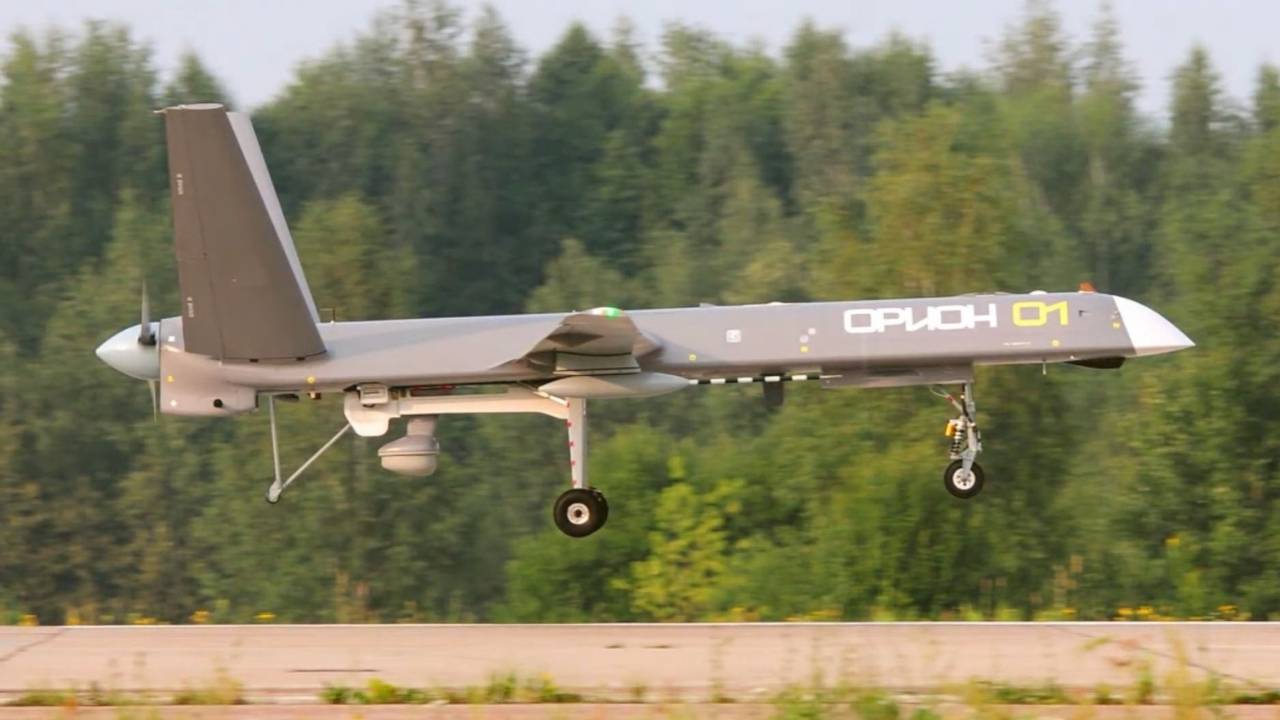Kronshtadt Orion UAV taking off from a runway during a flight test, showcasing its aerodynamic design and ISR equipment
