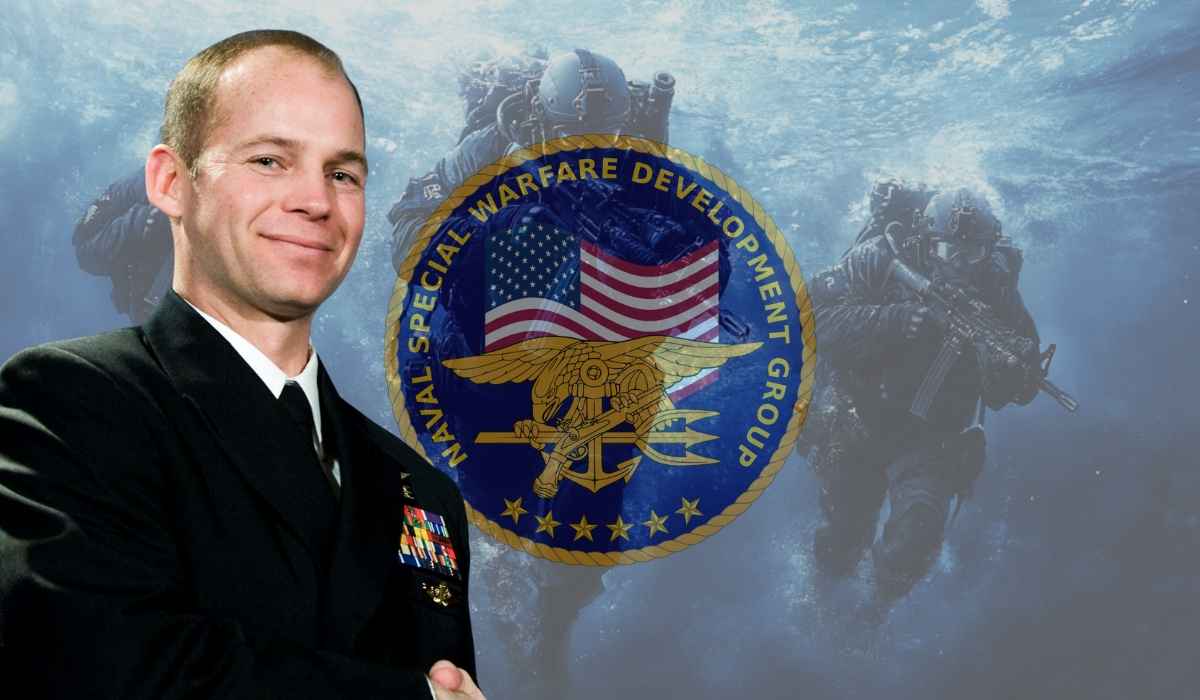 Navy SEAL Mike Day in dress uniform standing proudly before a Naval Special Warfare emblem with underwater SEAL team background