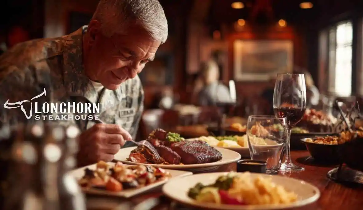 A smiling man in military uniform enjoying a steak meal at LongHorn Steakhouse