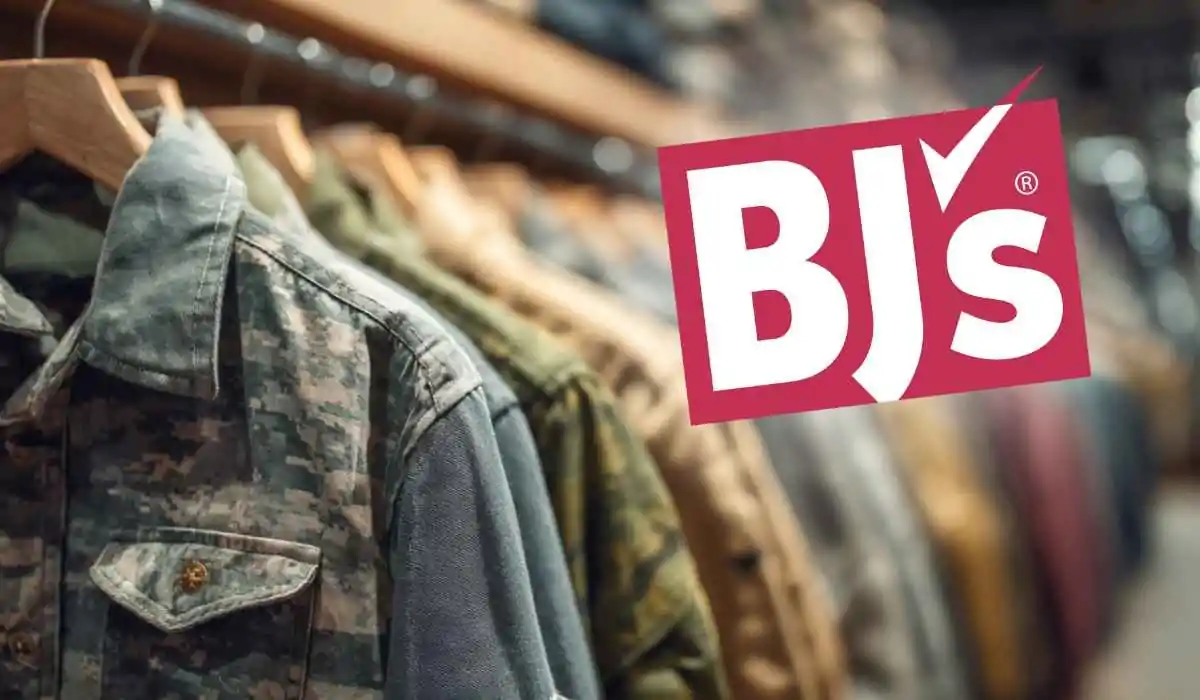 Military uniforms on hangers in a store, with the BJ’s Wholesale Club logo overlaid, symbolizing the company’s military discount program for service members
